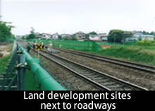 Land development sites next to roadways